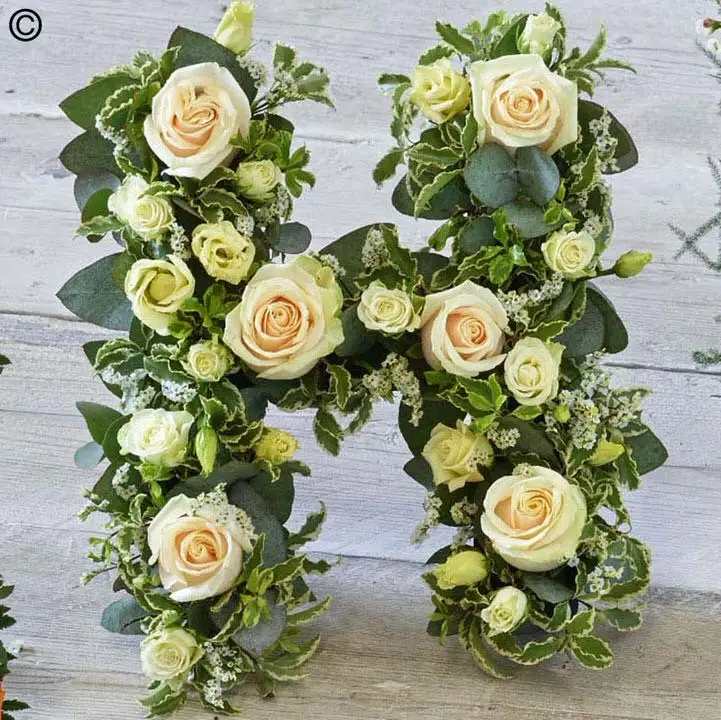 White funeral flowers 2025